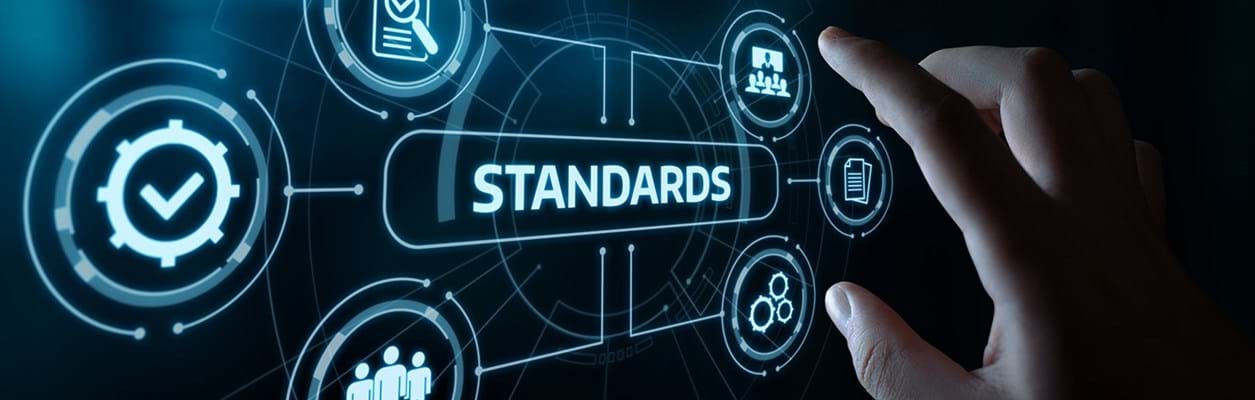 Sign that says "standards" with related icons